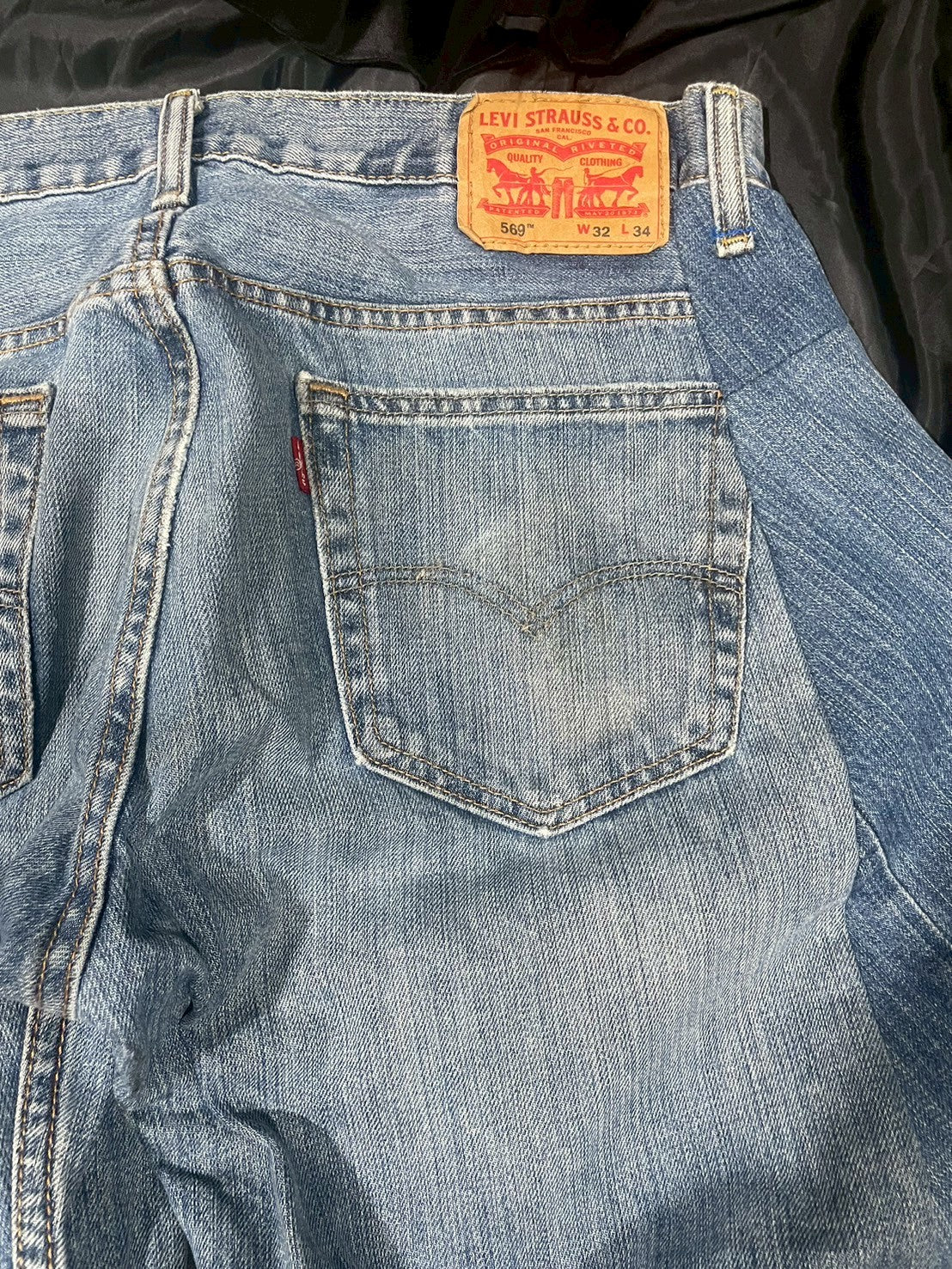 Custom jeans with tiger and dragon embroidery design