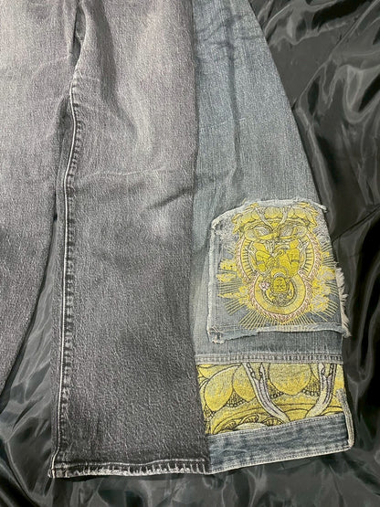 Custom jeans with Buddha statue embroidery design
