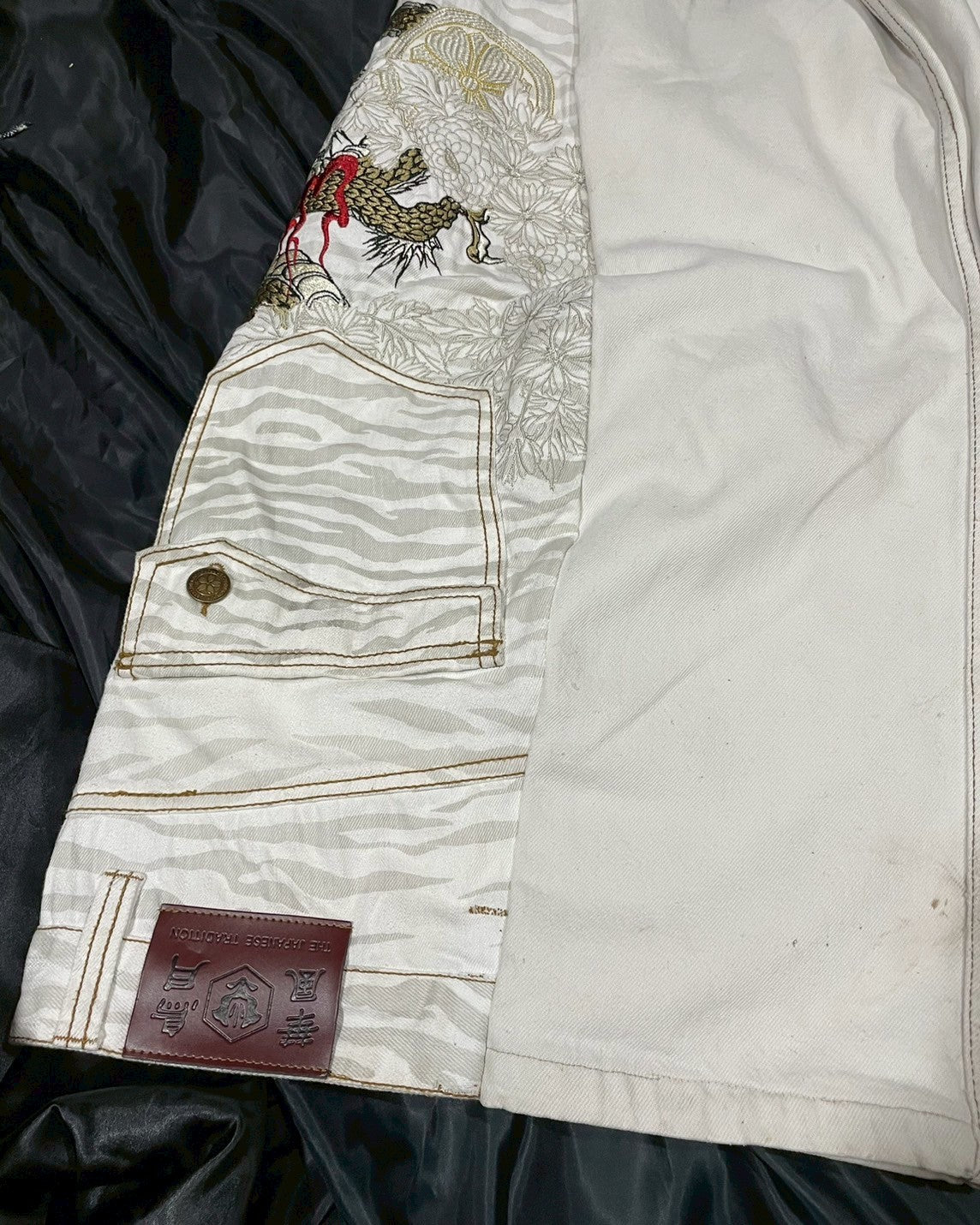 Custom jeans with tiger and dragon embroidery design